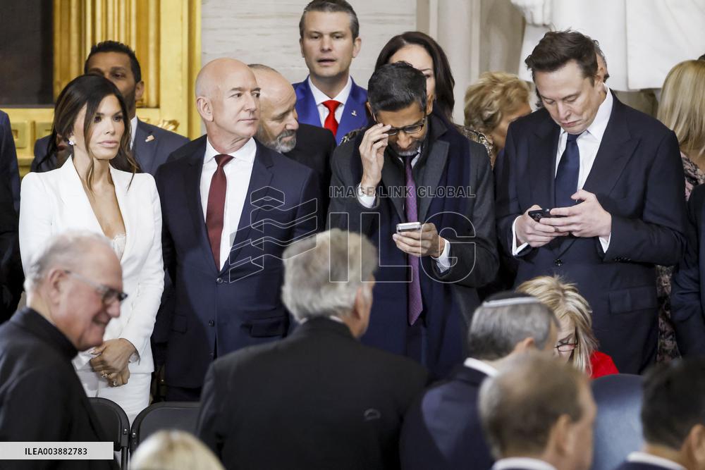 Elon Musk Holds His Phone At Trump Inauguration - DC