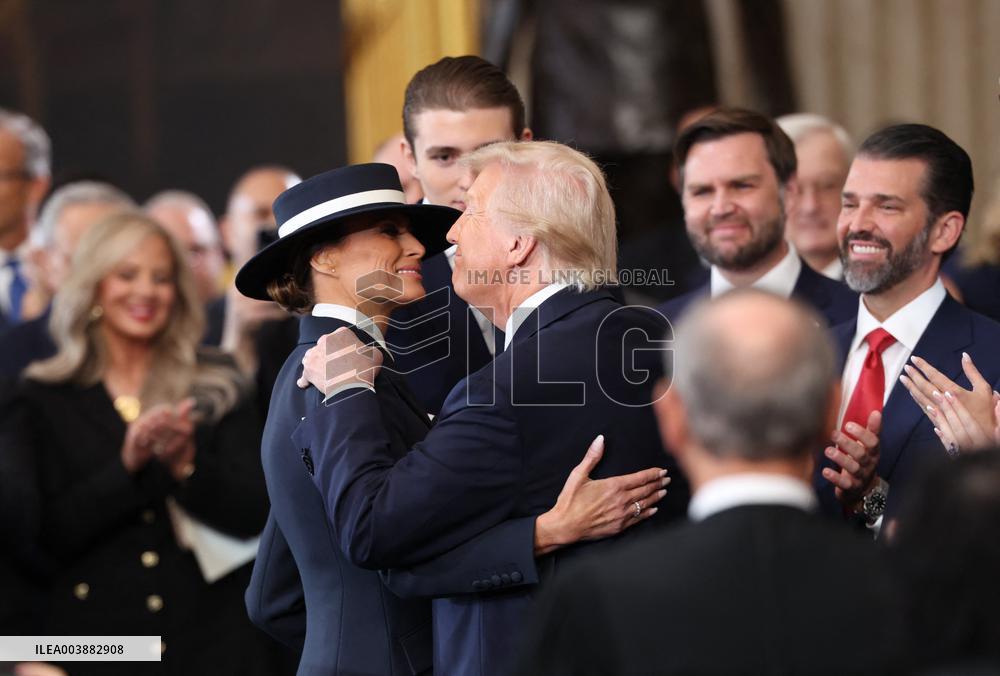 President Donald Trump And Melania Trump Embrace After The Oath - DC