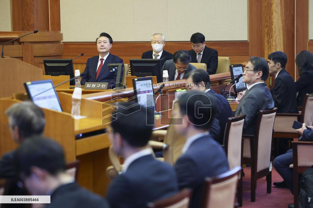 Impeached S. Korean president attends court hearing
