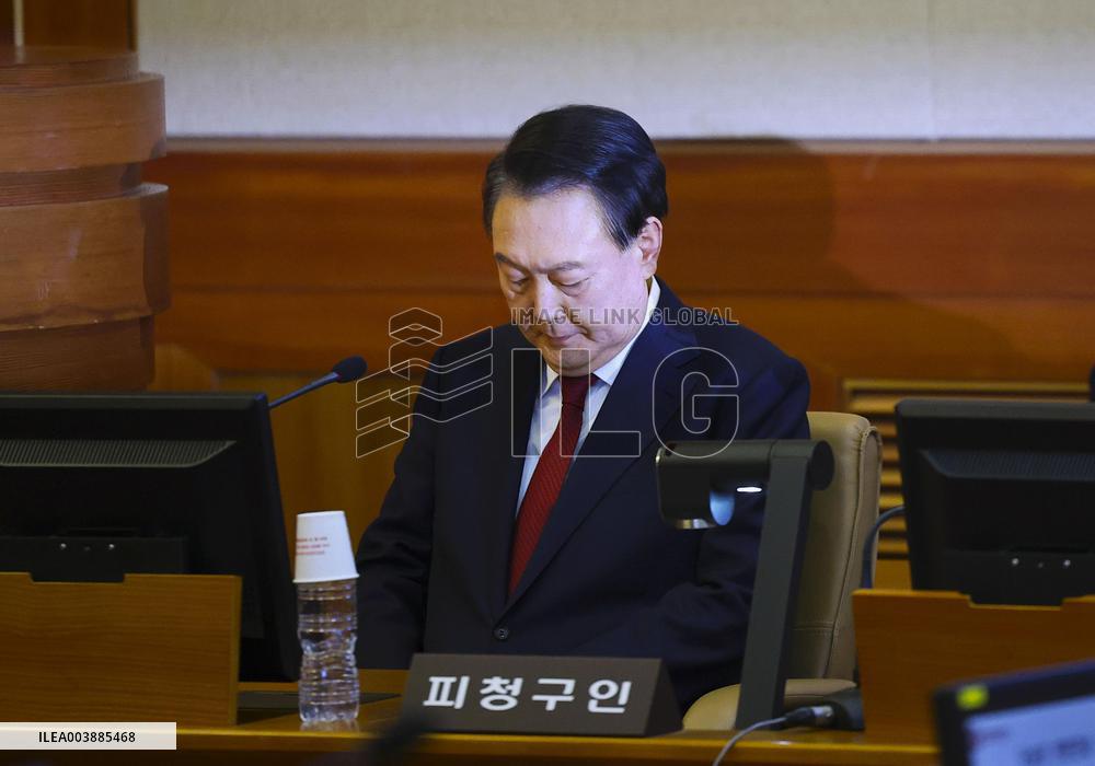 Impeached S. Korean president attends court hearing