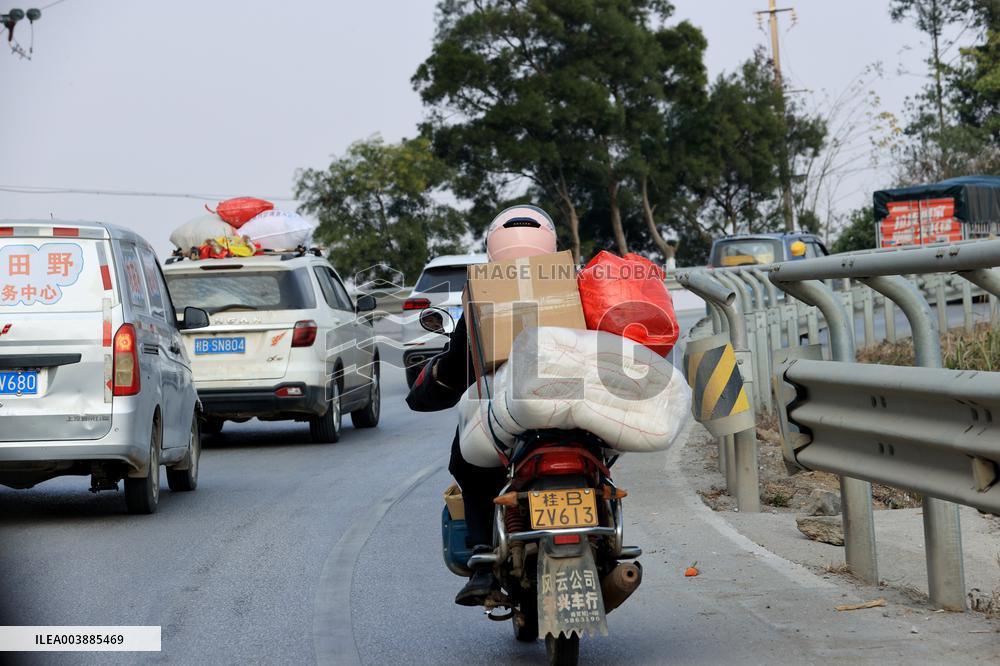 Migrant Workers Ride Motorcycles Home For Chinese Lunar New Year