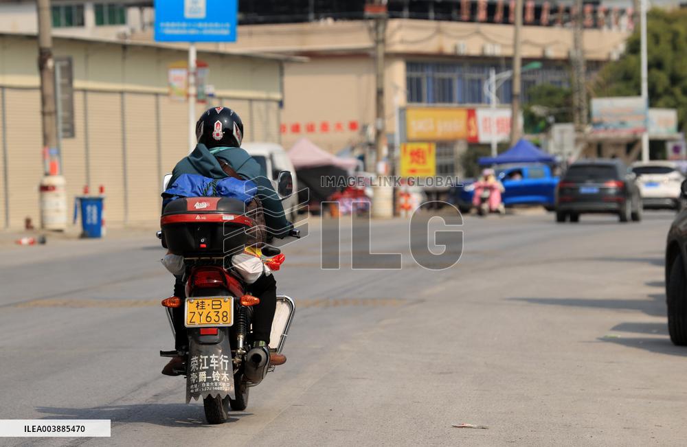 Migrant Workers Ride Motorcycles Home For Chinese Lunar New Year