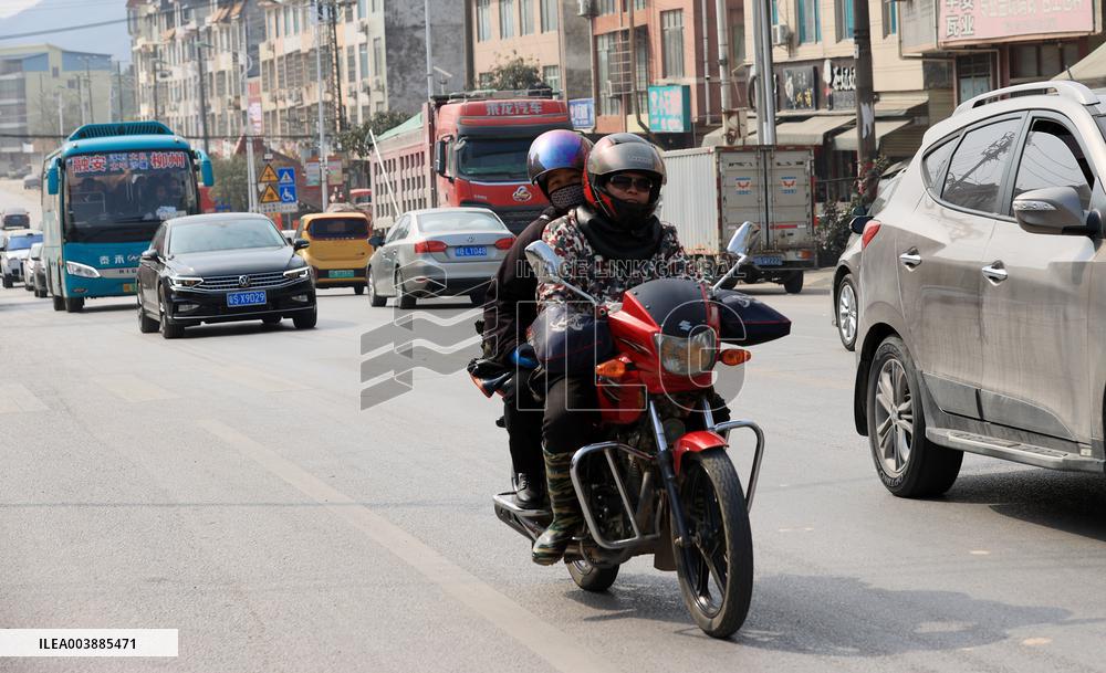 Migrant Workers Ride Motorcycles Home For Chinese Lunar New Year