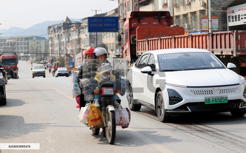 Migrant Workers Ride Motorcycles Home For Chinese Lunar New Year