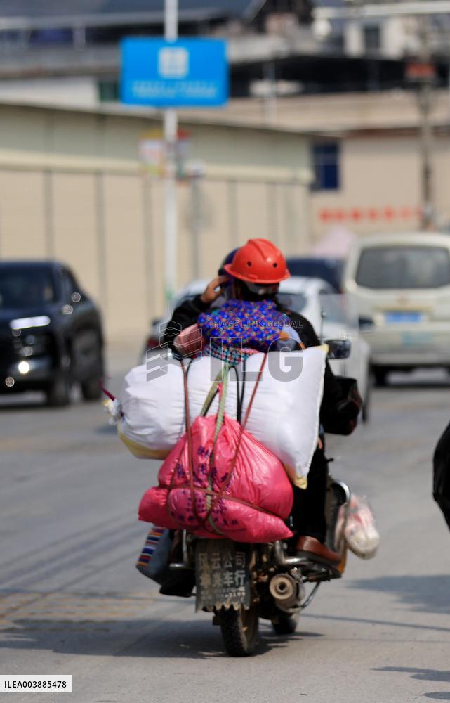Migrant Workers Ride Motorcycles Home For Chinese Lunar New Year