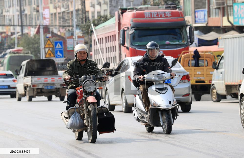 Migrant Workers Ride Motorcycles Home For Chinese Lunar New Year