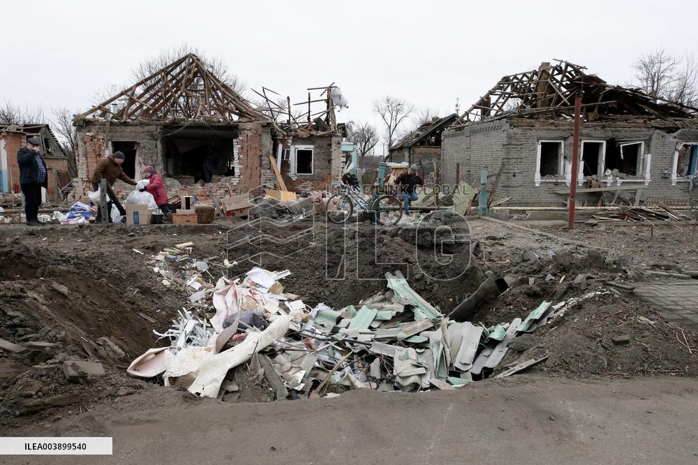 Aftermath of Russian shelling in Yasnohirka village in eastern Ukraine