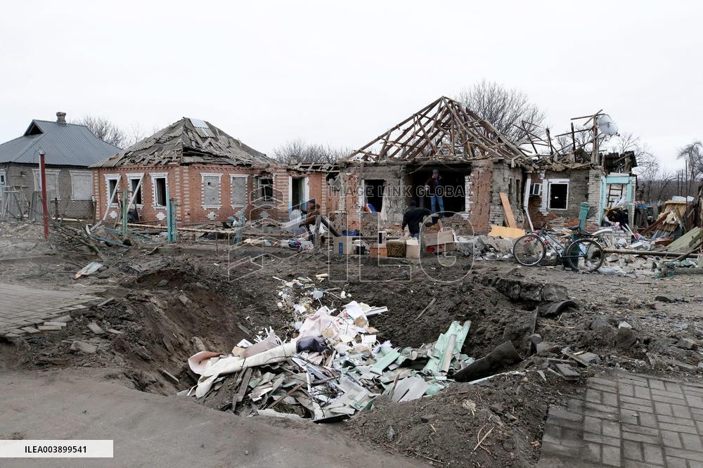 Aftermath of Russian shelling in Yasnohirka village in eastern Ukraine