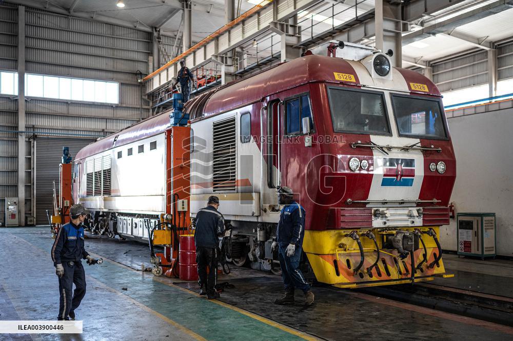 Maintenance Workers Fix Locomotive Parts - Nairobi