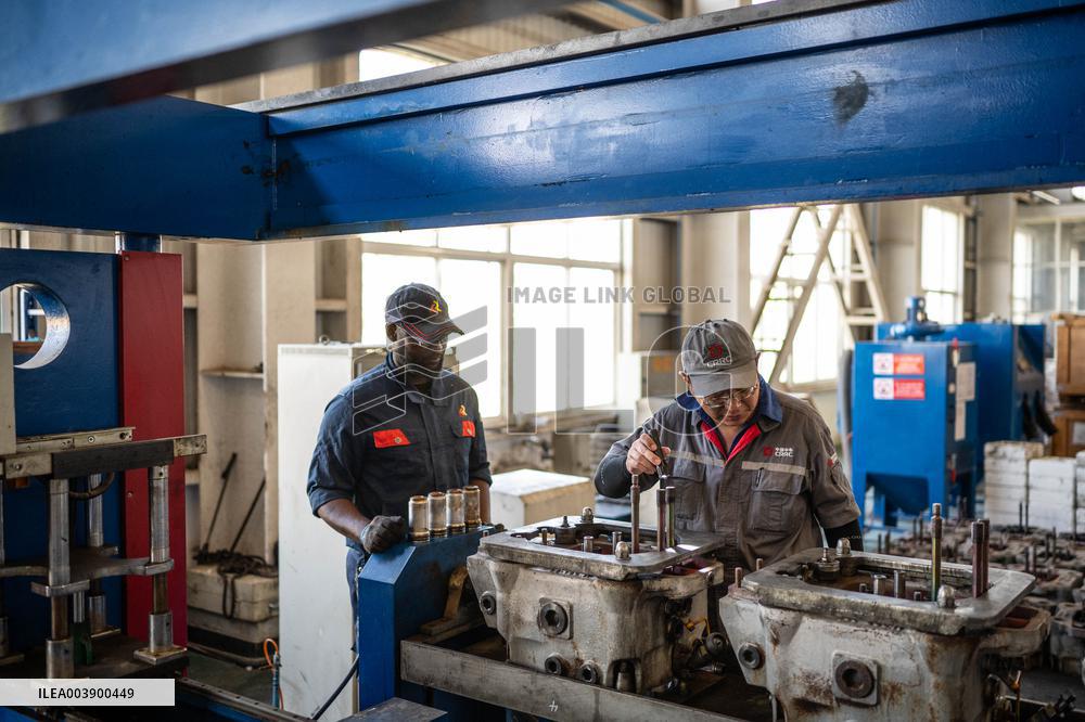 Maintenance Workers Fix Locomotive Parts - Nairobi