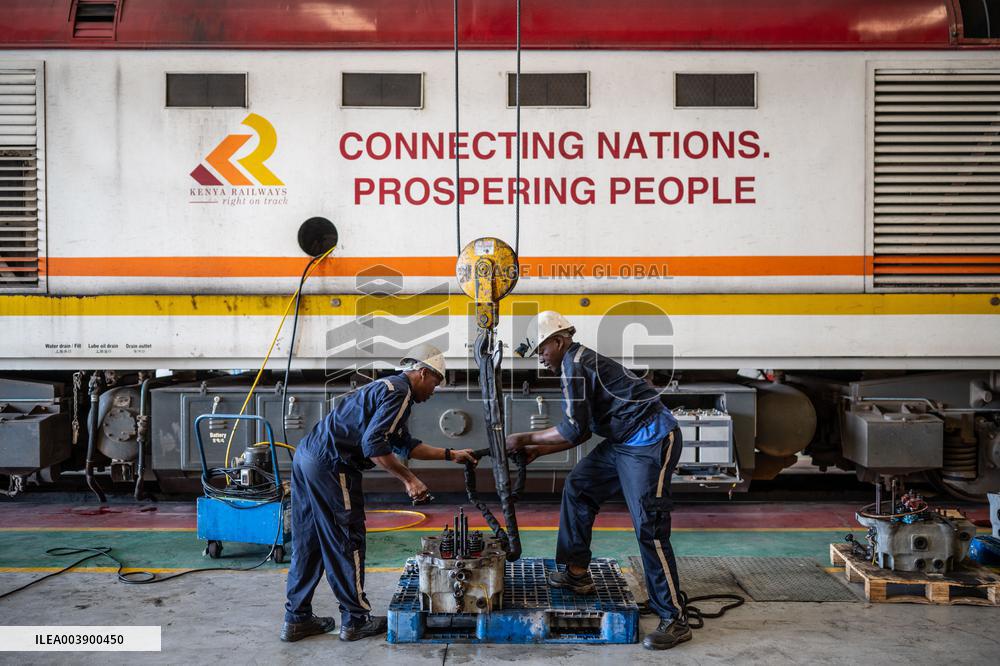 Maintenance Workers Fix Locomotive Parts - Nairobi