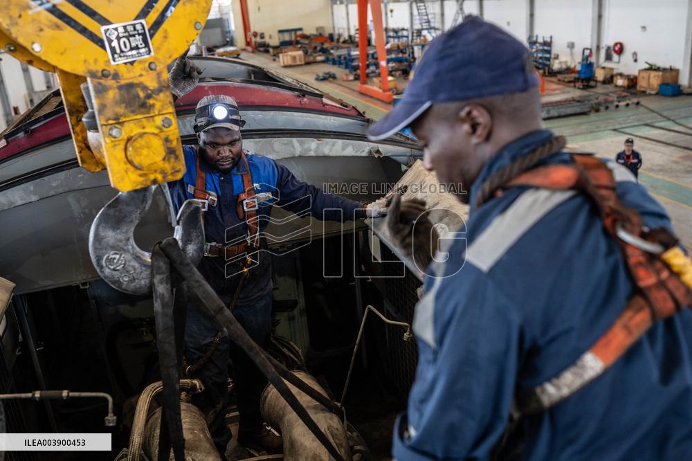 Maintenance Workers Fix Locomotive Parts - Nairobi