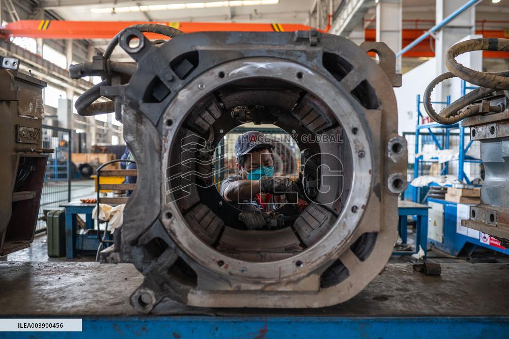 Maintenance Workers Fix Locomotive Parts - Nairobi