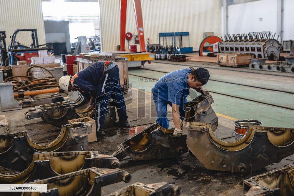 Maintenance Workers Fix Locomotive Parts - Nairobi