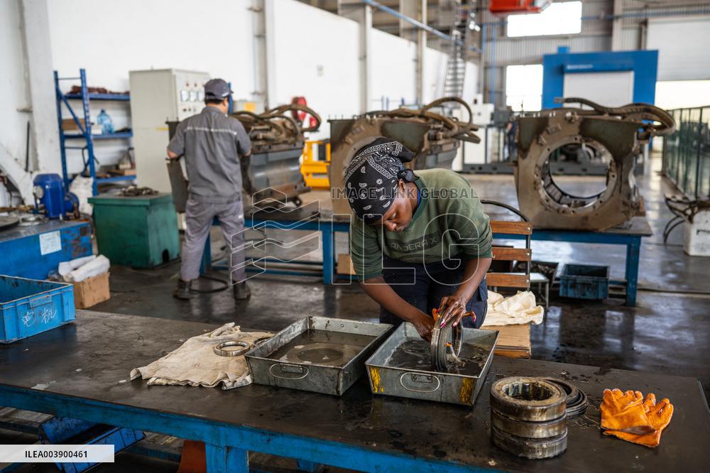 Maintenance Workers Fix Locomotive Parts - Nairobi