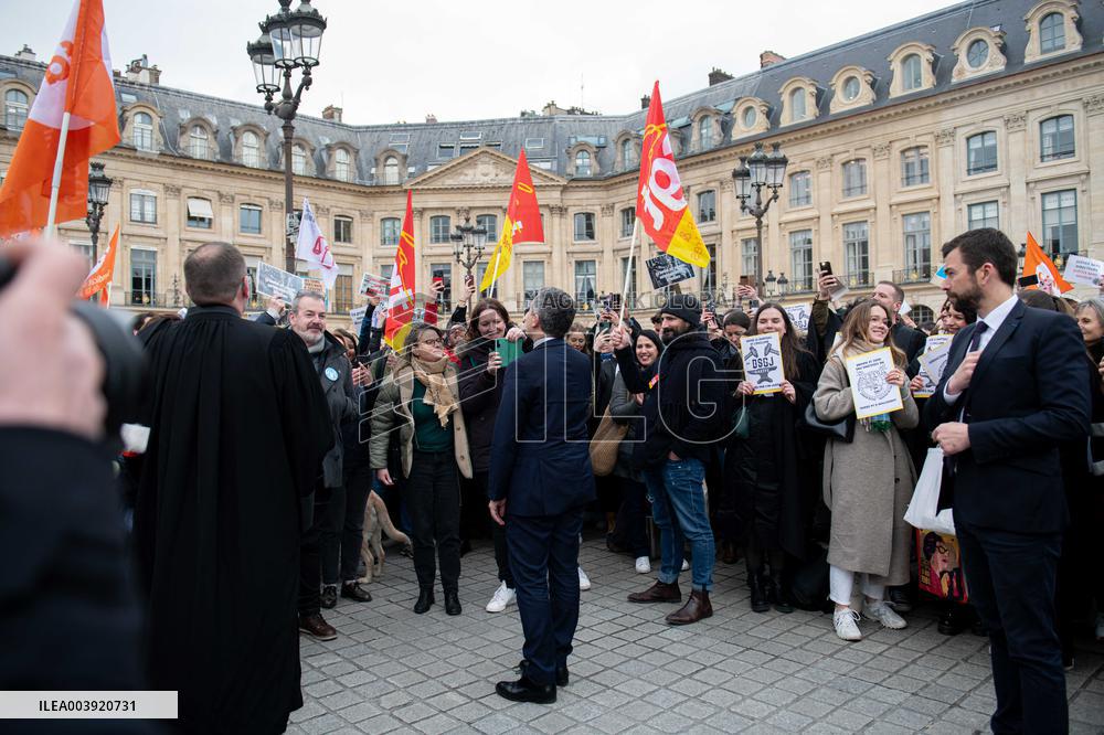 Gerald Darmanin talks to court clerks protesting at Place Vendome - Paris