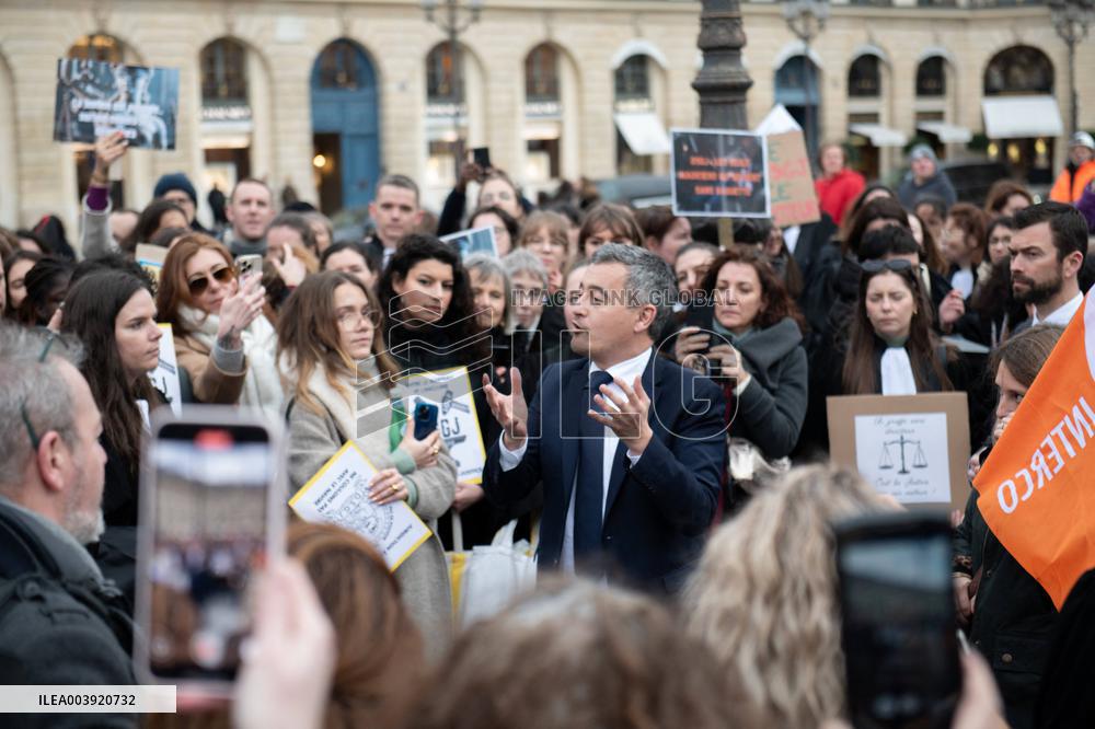 Gerald Darmanin talks to court clerks protesting at Place Vendome - Paris