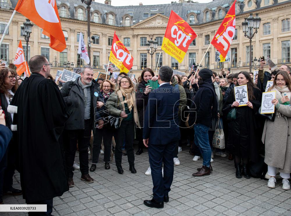 Gerald Darmanin talks to court clerks protesting at Place Vendome - Paris