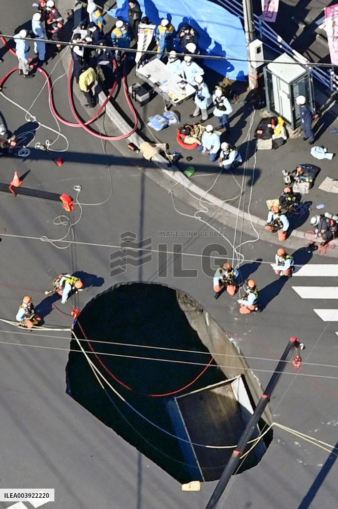 Sinkhole at intersection in Yashio, near Tokyo