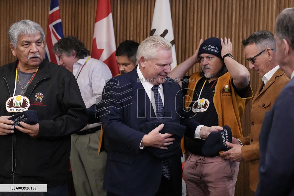 Doug Ford Hands Out 'Canada Is Not for Sale' Toques At A Press Conf.