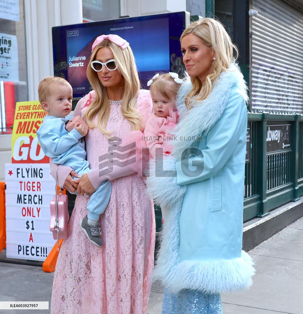Paris And Nicky Hilton With Their Children At Museum Of Ice Cream - NYC