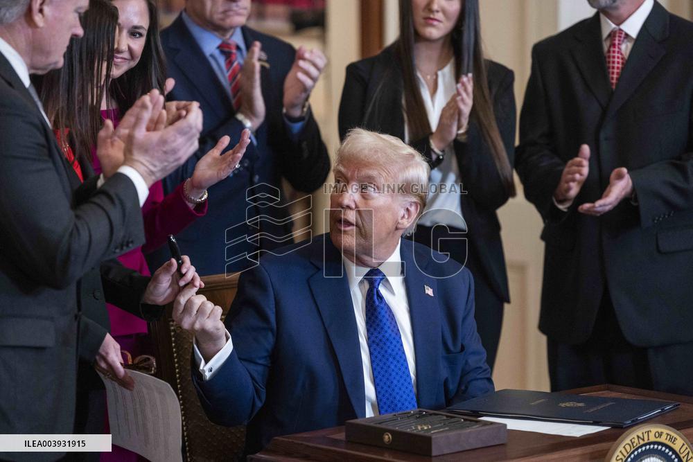 US President Donald Trump signs the Laken Riley Act