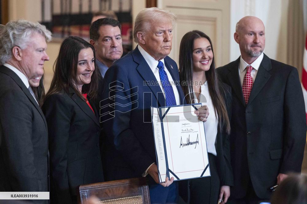 US President Donald Trump signs the Laken Riley Act