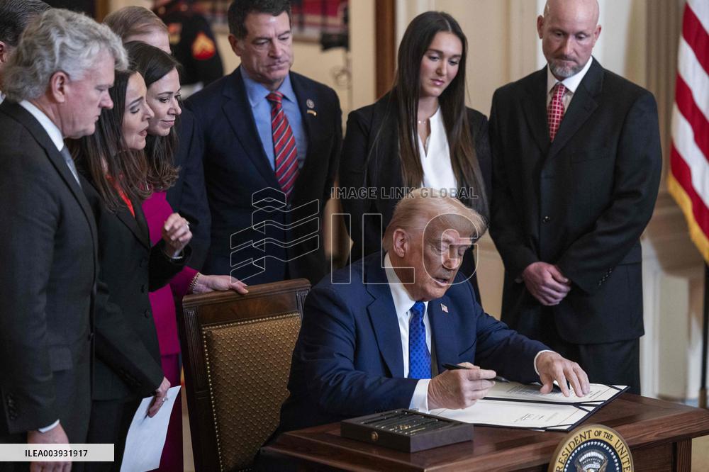 US President Donald Trump signs the Laken Riley Act
