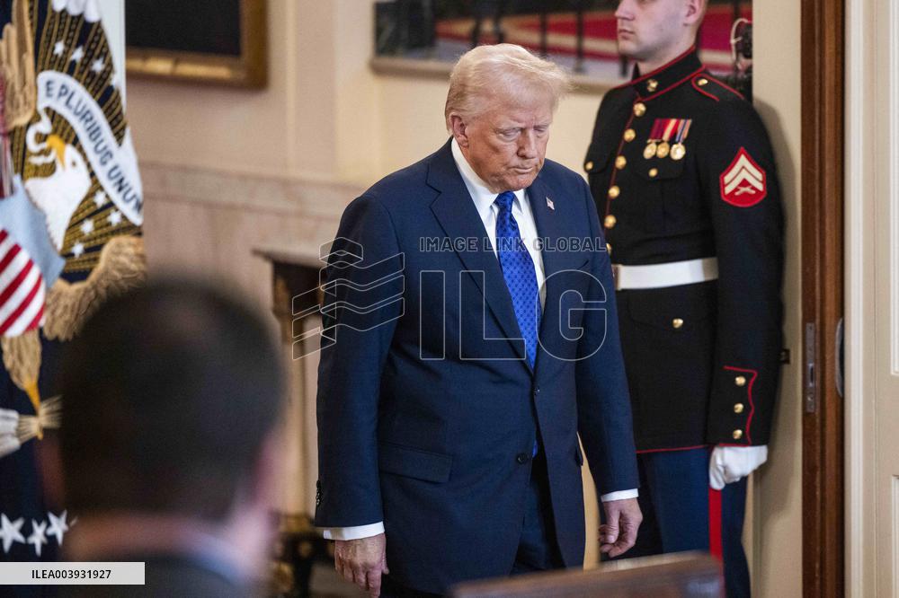 US President Donald Trump signs the Laken Riley Act