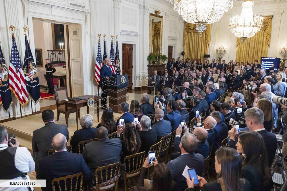 US President Donald Trump signs the Laken Riley Act