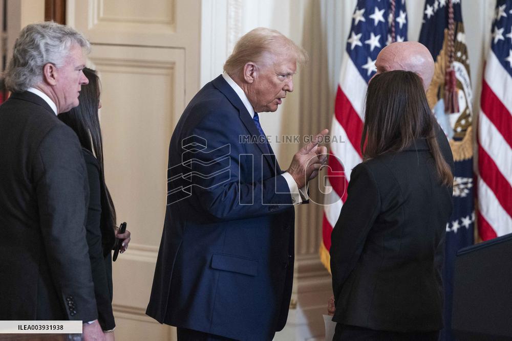 US President Donald Trump signs the Laken Riley Act