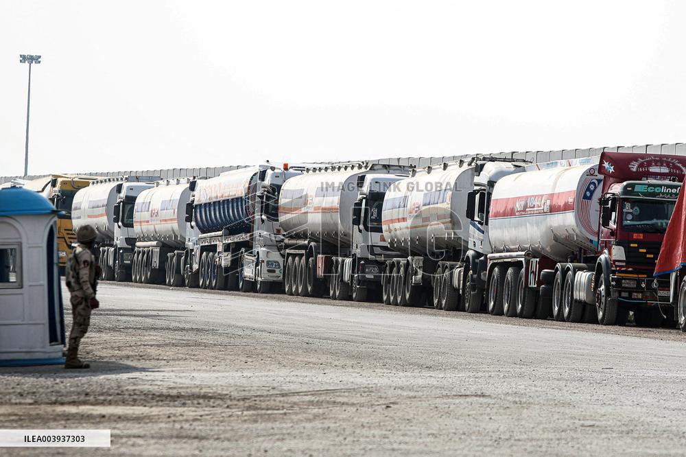 Aid Trucks Wait to Enter Gaza