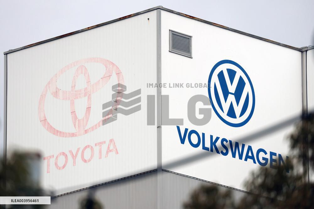 Toyota Motor Corporation and Volkswagen signage and logos