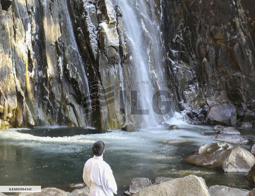 Frozen waterfall plunge pool in western Japan