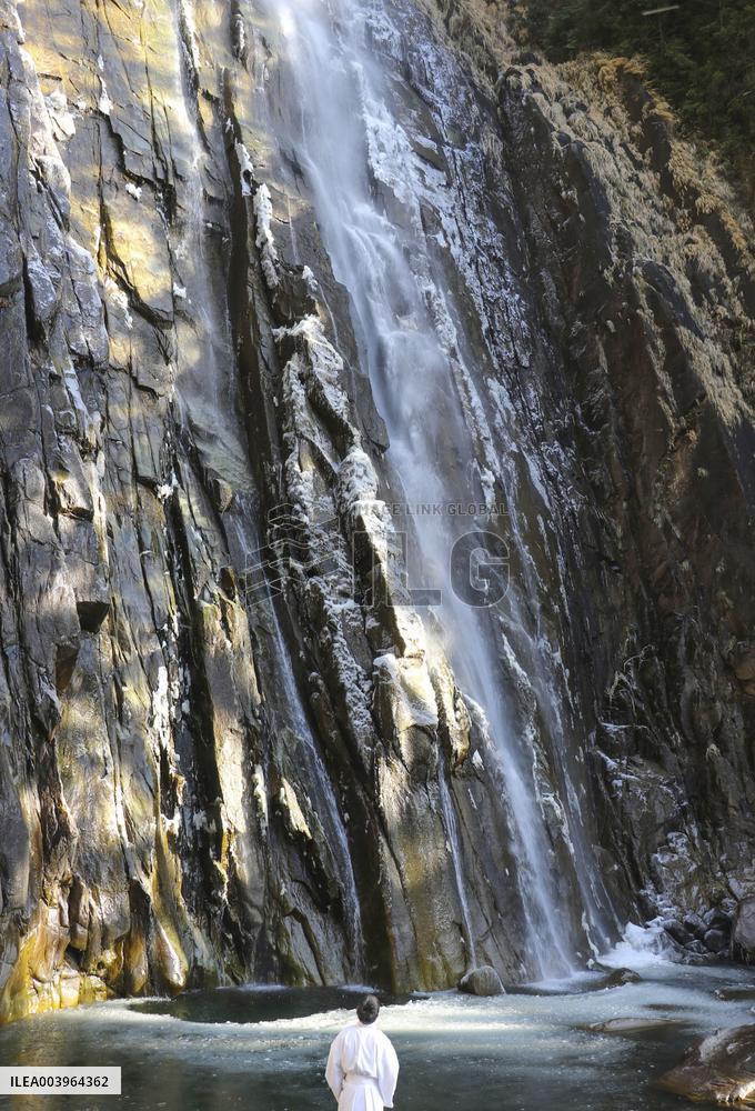Frozen waterfall plunge pool in western Japan