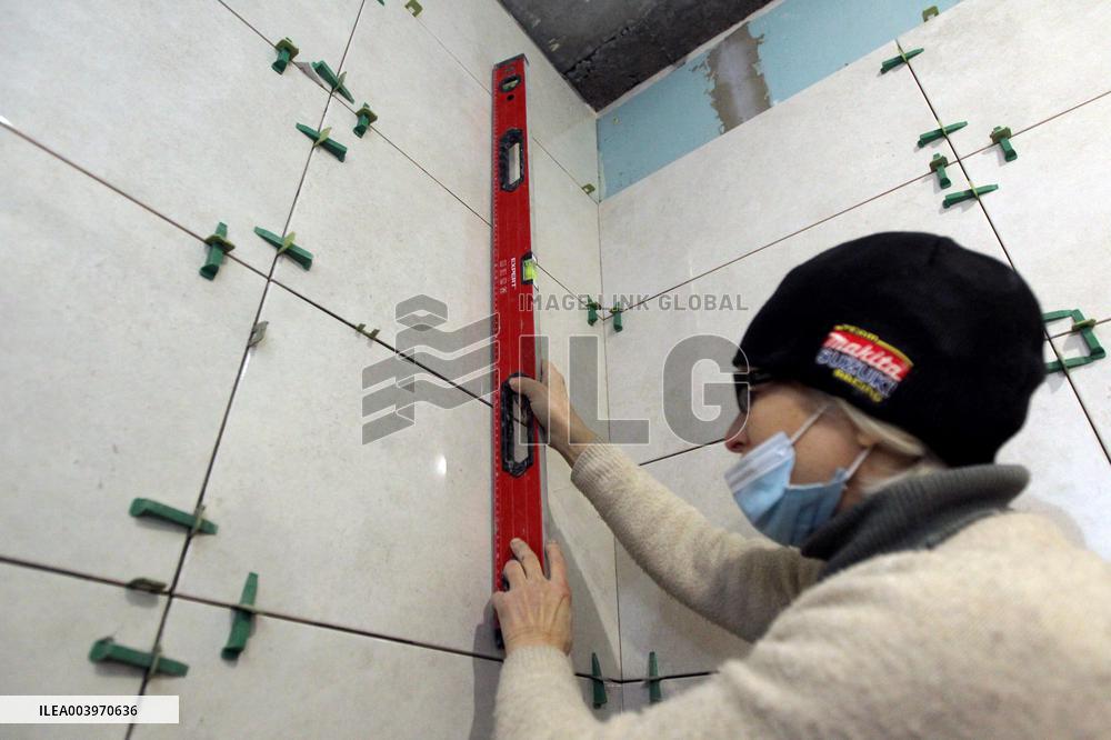 First womens construction battalion works to restore multi-storey building damaged by Russian shelling in Dnipro