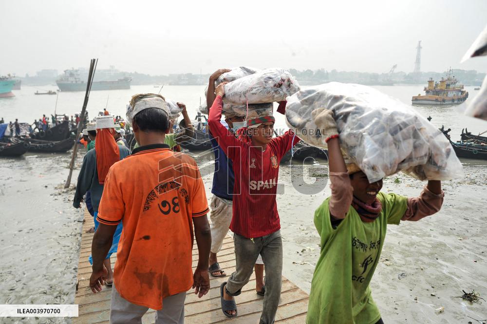 Laborers Unload Fish at Karnaphuli Fish Port - Bangladesh
