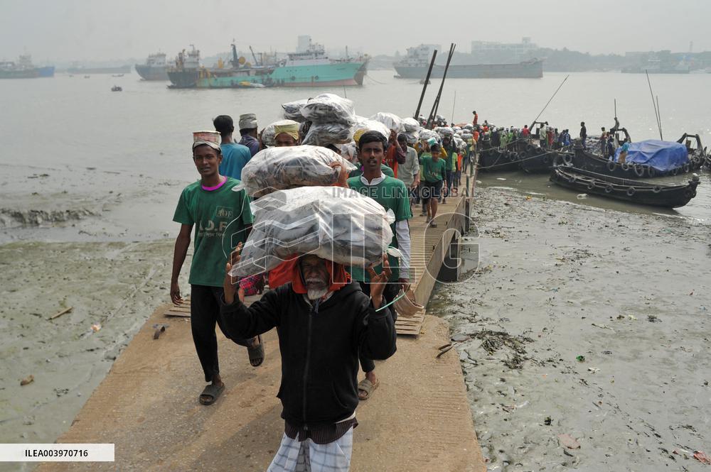 Laborers Unload Fish at Karnaphuli Fish Port - Bangladesh