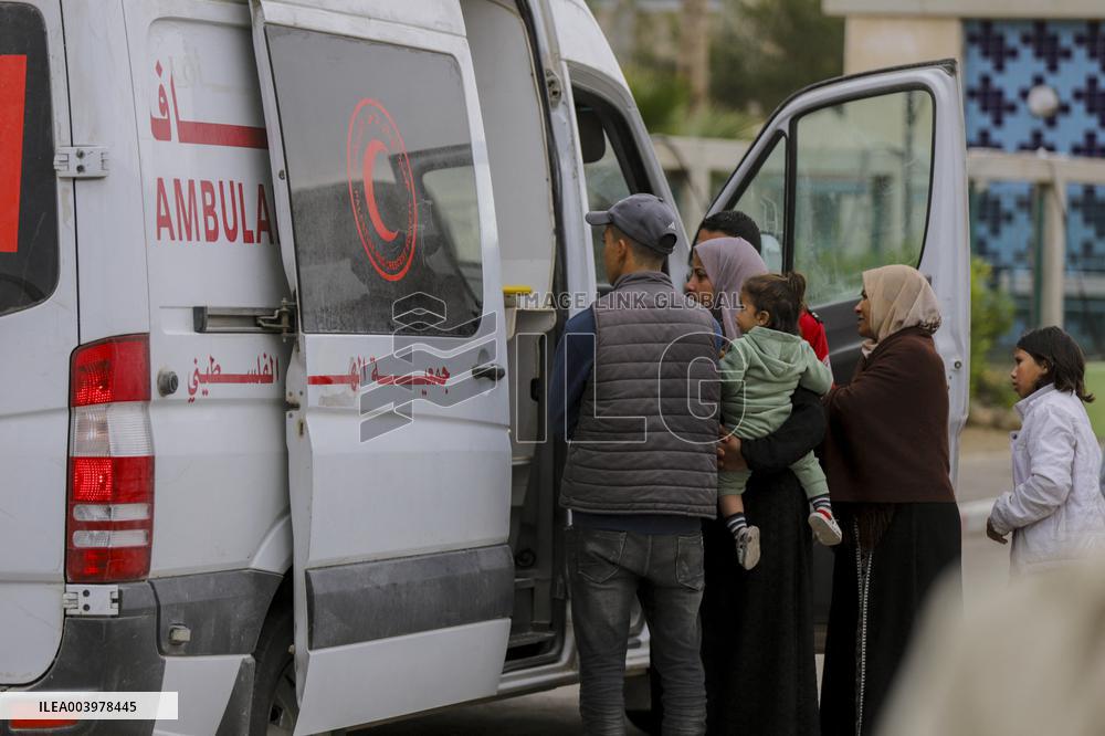 Gazan patients await to travel through the Rafah border crossing
