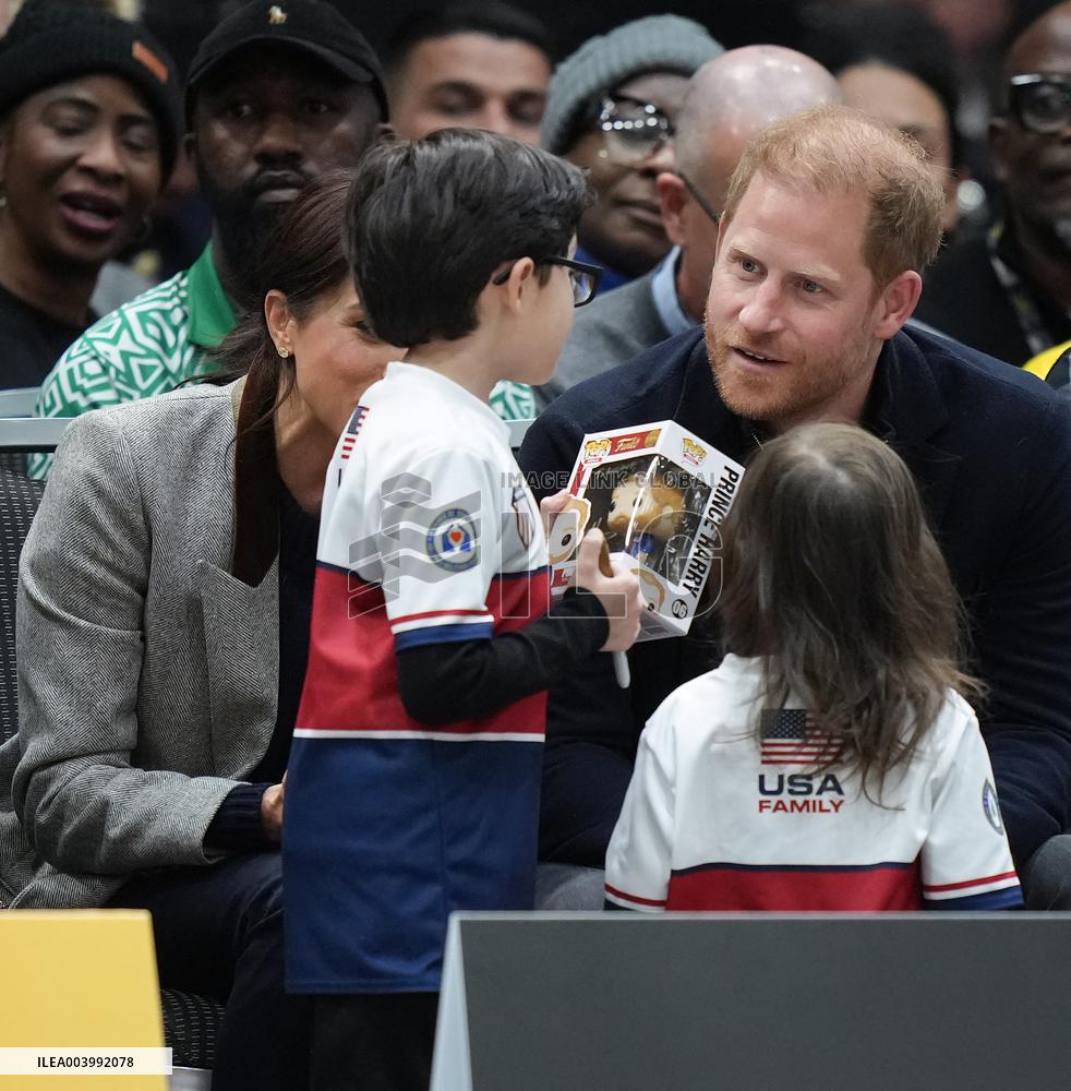 Duke Of Sussex Is Asked To Sign A Plastic Toy Of Himself - Vancouver