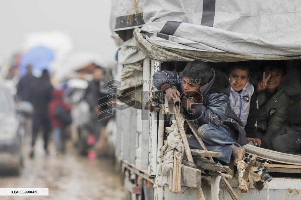 Displaced Palestinians Cross the Netzarim Corridor - Gaza