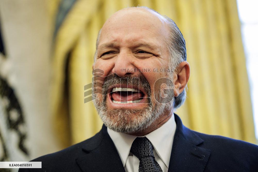 DC: U.S. President Trump Signs Executive Orders in the Oval Office