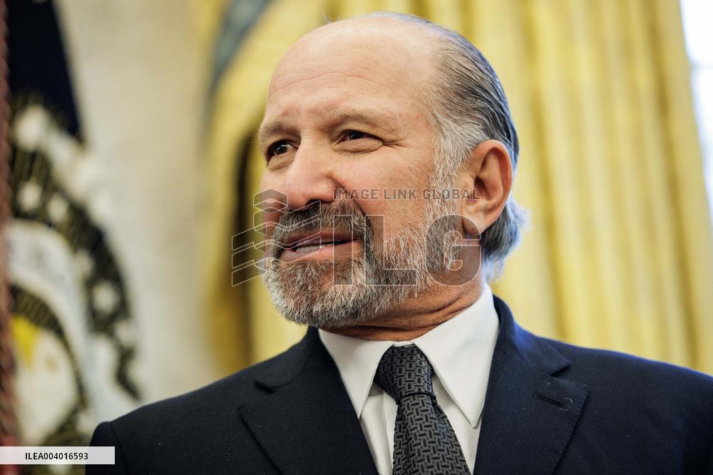 DC: U.S. President Trump Signs Executive Orders in the Oval Office