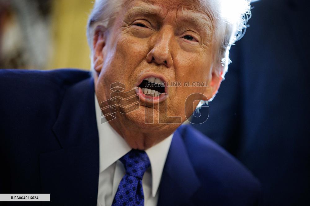 DC: U.S. President Trump Signs Executive Orders in the Oval Office