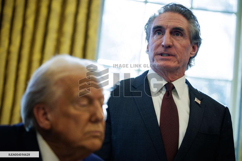 DC: U.S. President Trump Signs Executive Orders in the Oval Office