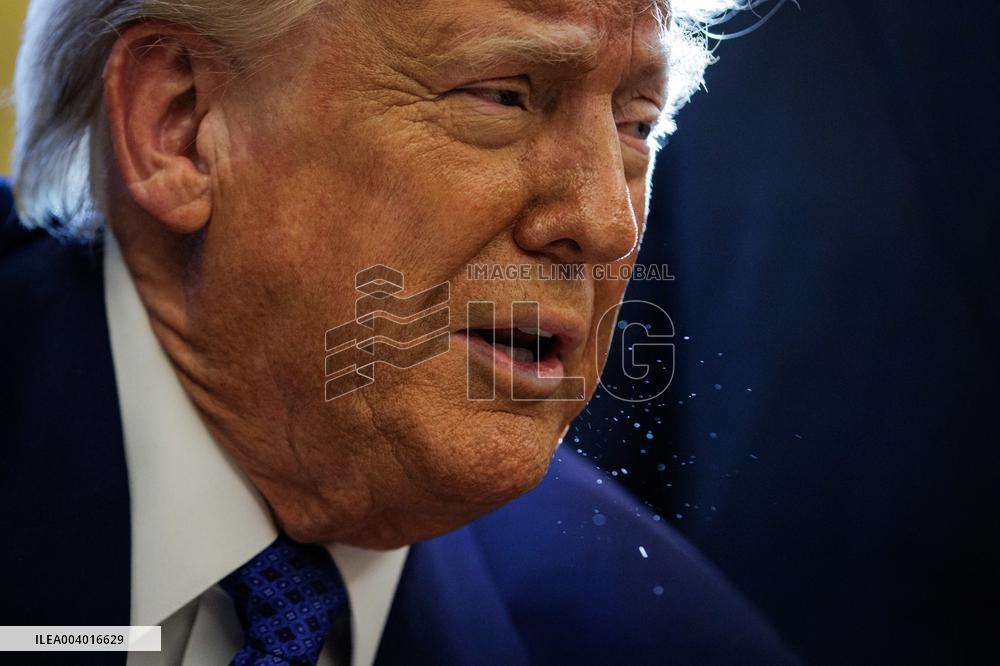 DC: U.S. President Trump Signs Executive Orders in the Oval Office