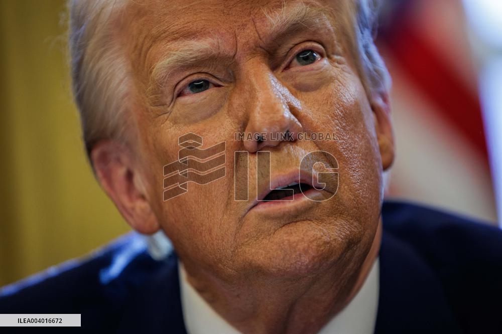 DC: U.S. President Trump Signs Executive Orders in the Oval Office