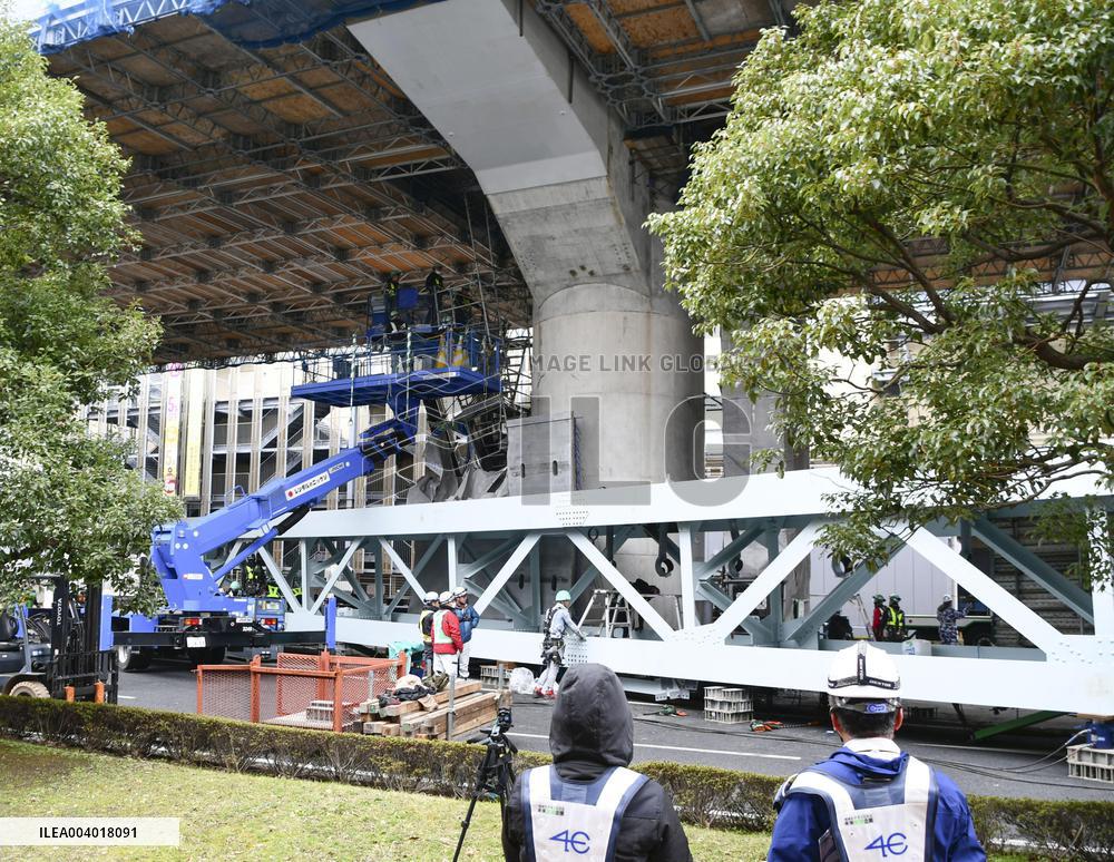 Bridge girder blocks road in southwestern Japan