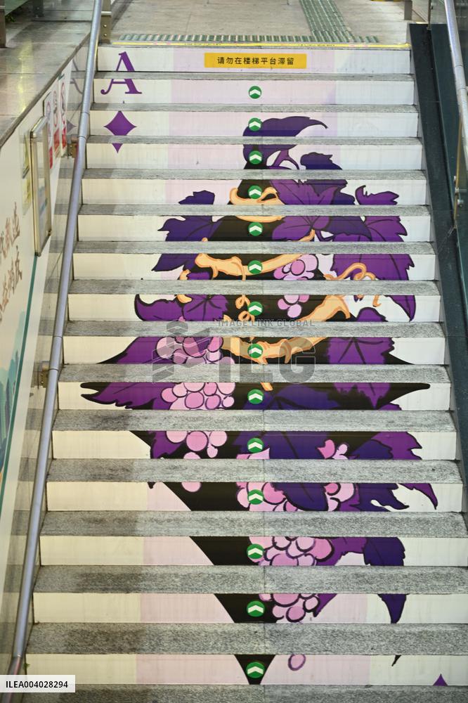 Graffiti Paintings on The Stairs of AnExit of A subway Station in Nanning