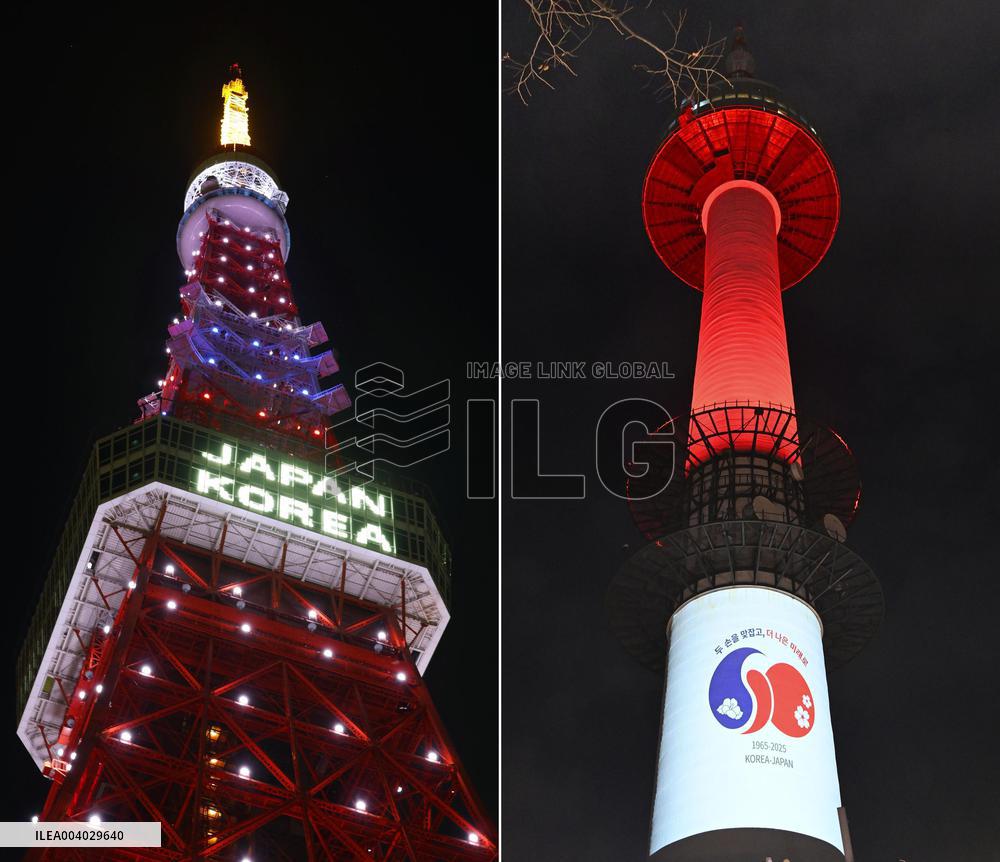 Tokyo Tower and N Seoul Tower lit up